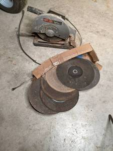 lot 23 image: 14 Ryobi saw with extra cutting wh...