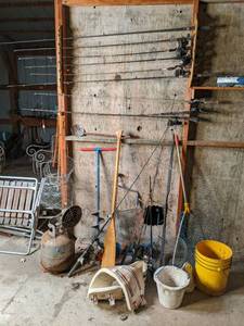 lot 76 image: Fishing lot, includes several rods ...