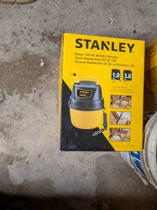 lot 92 image: Stanley 1 gallon wetdry vac new in...