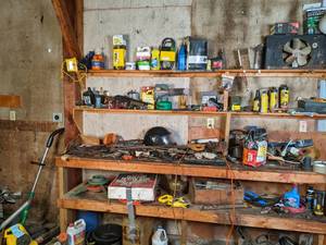 lot 97 image: Large garage lot. contents of 2 she...