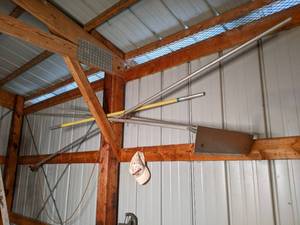 lot 32 image: Roof rake and pole saw with extensi...