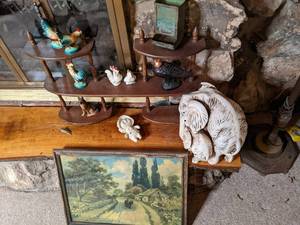 lot 221 image: Ceramic elephants wall shelf of fig...