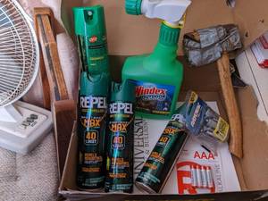 lot 130 image: 4 cans of bug spray, 3 are 40% Deet...