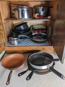 lot 139 image: Contents of cupboard, mostly pots a...