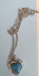 lot 180 image: Turquoise heart pendant on silver c...