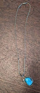 lot 182 image: Turquoise pendant with feather on n...