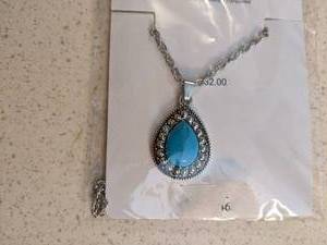 lot 181 image: Teardrop turquoise pendant on silve...