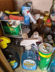 lot 133 image: Cabinet under kitchen sink full of ...