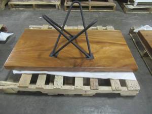 Solid Wood Walnut Coffee Table With Metal Star Base  Approximate Dimensions 48 x 25 x 2 - Slight Scratch and Dent, Slight mold growth from sitting in warehouse (can be sandedremoved) NO RESERVE
