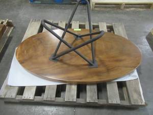 Solid Wood Elliptic Walnut Coffee Table With Metal Star Base  Approximate Dimensions 48 x 25 x 2 - Slight Scratch and Dent, Slight mold growth from sitting in warehouse (can be sandedremoved) NO RESERVE