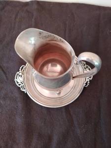 lot 11 image: Sterling Silver Creamer And Plate. Creamer Made By Frank M. Whiting & Company