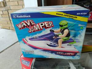 lot 47 image: Two Remote Control Water Crafts