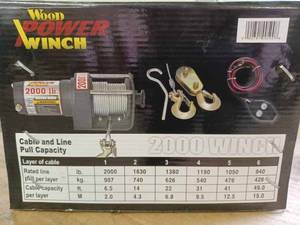 New in the Box Wood Power 2000 lb. 12-Volt Winch - has 49-foot Air Craft Cable