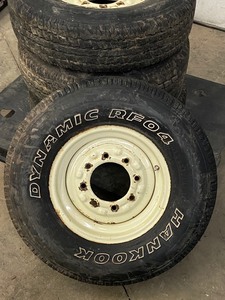 lot 2-A image: Set Of (4) Skid-Loader Snow Tires With Wheels