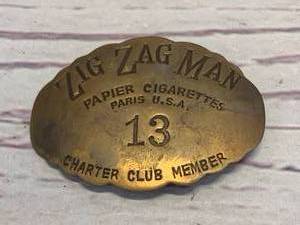 lot 39 image: Zigzag Man Brass Charter Club Member 2  Long Pin