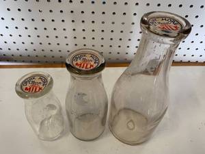 lot 29 image: 3 Vintage Glass Milk Bottles