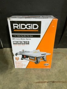 RIDGID 6.5 Amp Corded 7 in. Table Top Wet Tile Saw. See Pictures