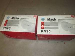 2 packs of 50 pcs of non medical KN...