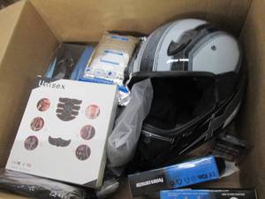 box of exercise misc and a helmet ...