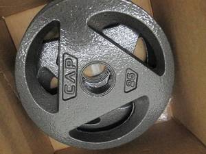 2 metal 25lb weights and a weight l...