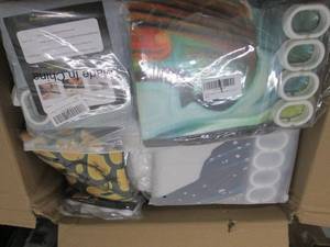 box of shower curtains , toilet sea...