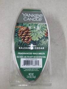 box full of yankee candle balsam an...
