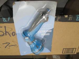 box of solar lights and sprayer noz...
