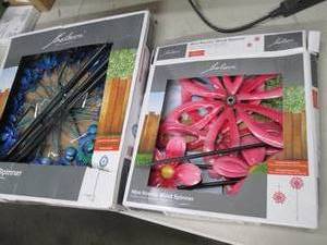 2 belair kinetic wind spinners both...