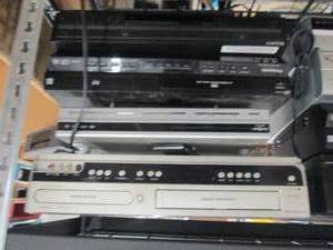 3 vhs players and a under cabinet d...