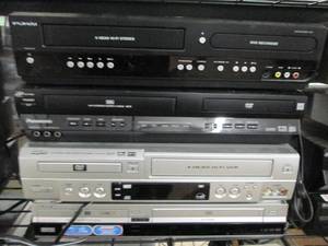 4 vhs players all power on ...