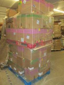 pallet of folders and binders and z...