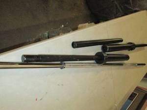2 weight lifting bars black one is missing the pins
