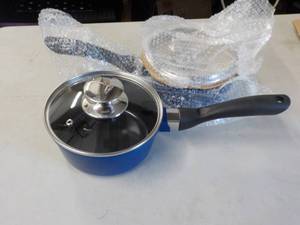 lot 263 image: 2 - 1 12 Quart Sauce Pans with Gla...