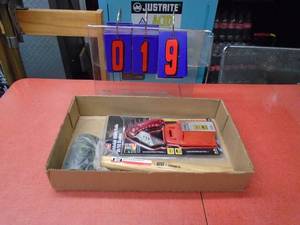 Flat of rubber mallet & utility knife. As shown.