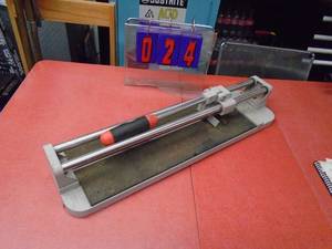 Brutus tile cutter. Lightly used. As shown.
