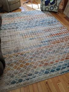 lot 22 image: Geometric Multi-Colored 10 x 8 Area Rug with Rug Pad