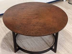 lot 12 image: Hammary Nueva Round 35 Cocktail Table in Copper