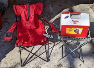 lot 96 image: Camping lot Playmate Elite Cooler, Foldable Camping Chair, & Metal Folding Table