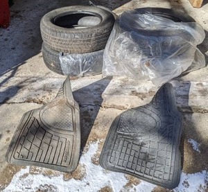 lot 97 image: Set of (4) Michelin Tires 22565R17 & Pair of Good Year Floor Mats