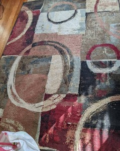 lot 148 image: Area Rug - Circles & Squares in Reds, Browns and Beige