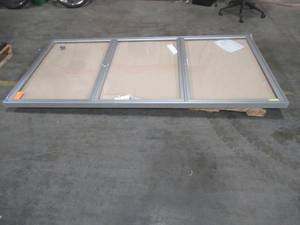 lot 401 image: Ghent 3 Door Enclosed Fabric Bulletin Board, Silver Frame, 96W x 48H - Plexi Glass needs replacing.