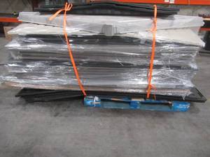 lot 437 image: PALLET OF MISCELLANEOUS PLASTIC STORAGE SHED WALLS AND PARTS (ModelManufacture unknown, Could be parts from multiple sheds) FOR PARTSRESTORE