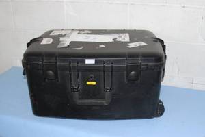 lot 86 image: Protective Molded Plastic Lightweight Equipment Case with Telescoping Handle and Wheels