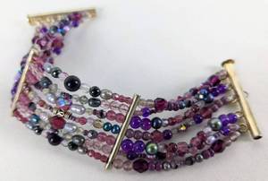 lot 8 image: Seven Crafted Bead Bracelets - Some with Sterling Silver