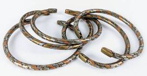 lot 279 image: 10 Metal Cuff Bracelets from Ghana - Trimetal Twists, Fused Bands, Three Tones