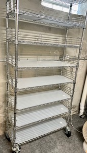 lot 100 image: Marvelous Metal Storage Shelf on Casters