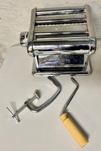 lot 108 image: Dalia Pasta Machine and a Book