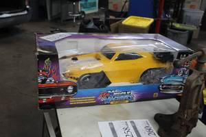 lot 1264 image: Muscle Machines 69 Camaro 18 Scale Full Function Radio Control Car (in original box)