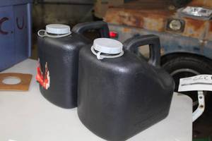 lot 1295 image: Lot of (2) Plastic Drain Oil Recycle Bottles