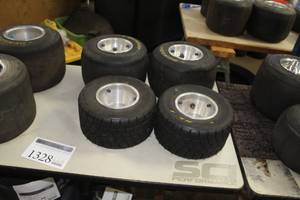 lot 1328 image: Lot of (4) Dunlop 10x4.50-5 Racing Go-Kart Tires on 5 Rims